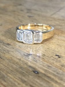 18ct platinum emerald cut diamond engagement ring